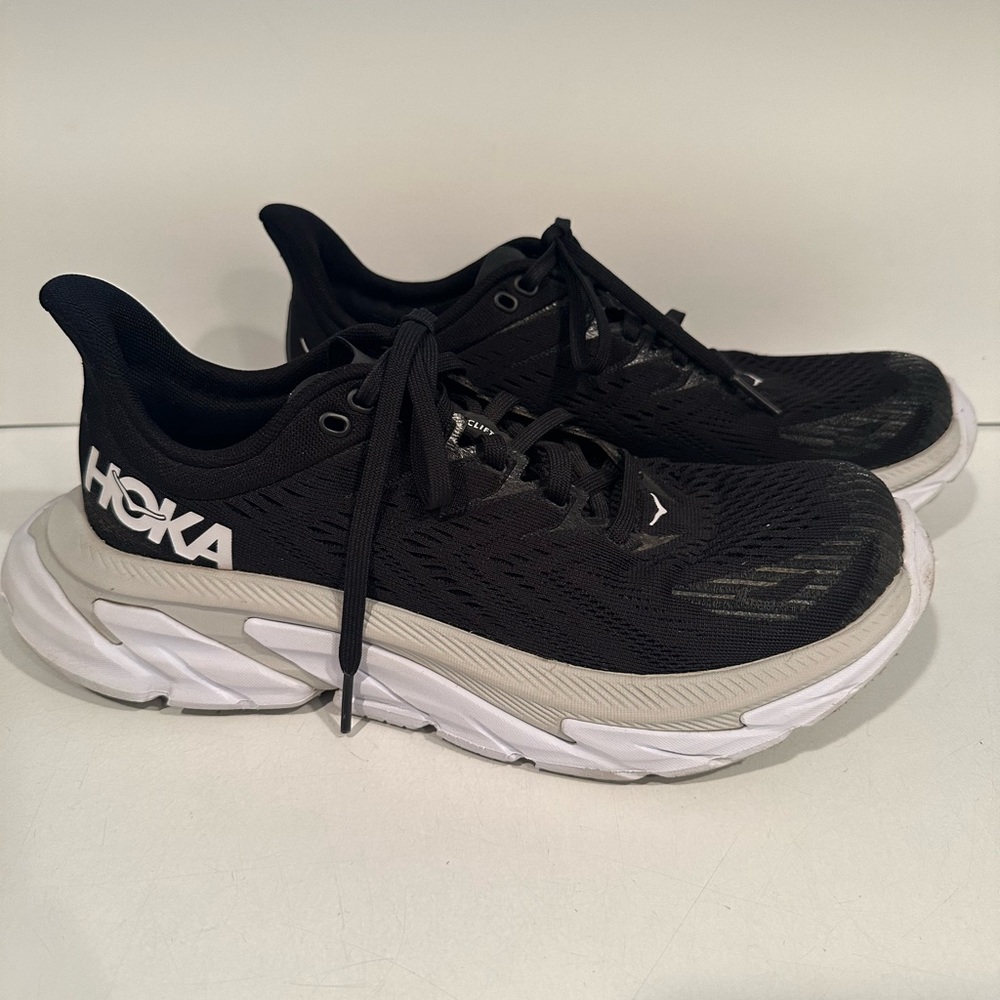 HOKA Clifton Edge women’s size 8 black &white running shoe.